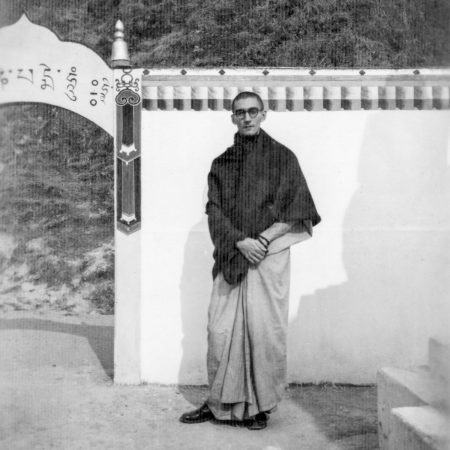 Sangharakshita outside Tibetan temple in Darjeeling, India. 1950